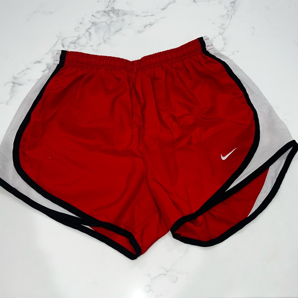 Red Nike shorts